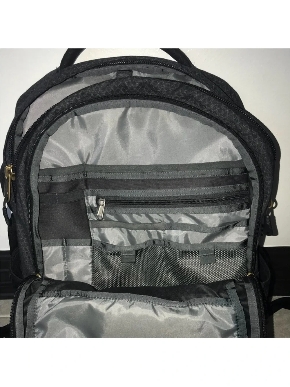 The North Face Black Backpack with Gold Accents Women’s